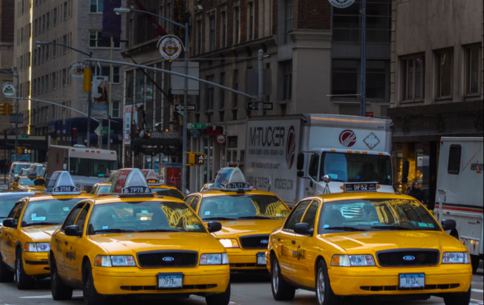 taxis displaying transit ads