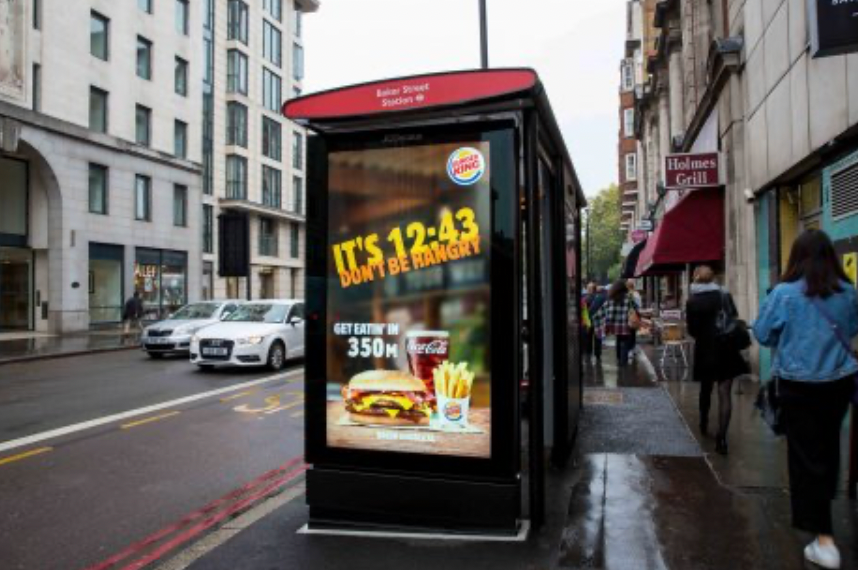 Burger King DOOH changing menu ad in a bus station 2 